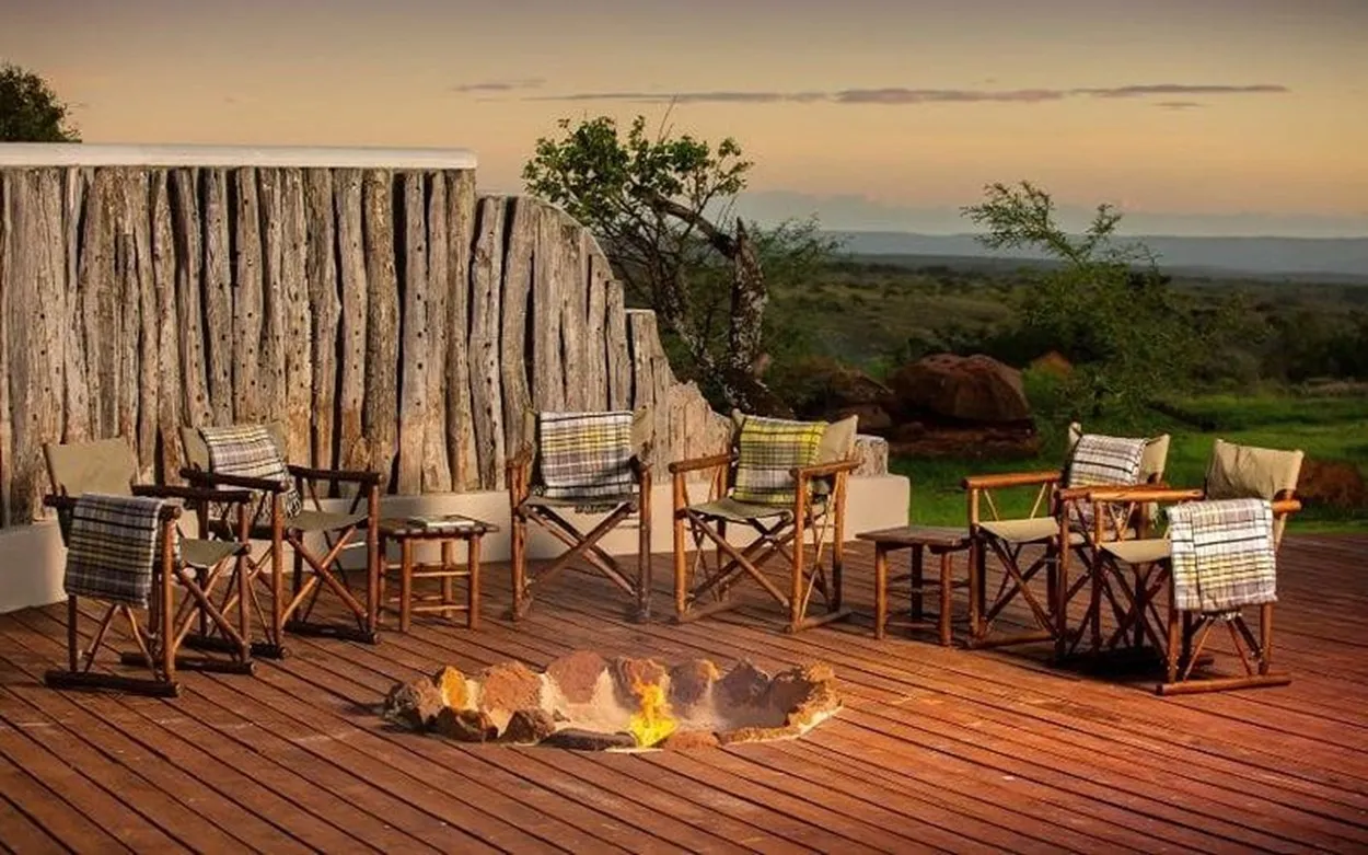Main Lodge deck with fire pit overlooking the bushveld